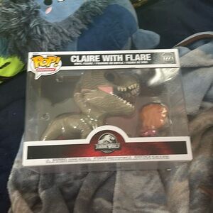Claire with flare pop figure used in box